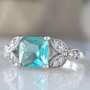 Elegant Silver and Blue Gemstone Ring